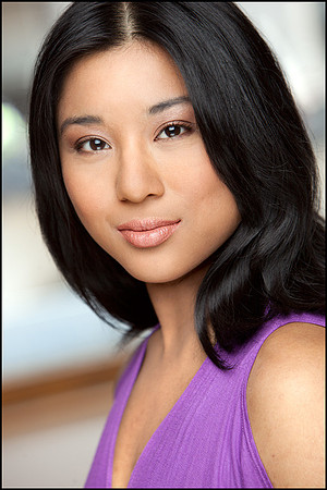 Elegant headshot with calm, modern expression