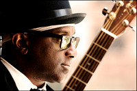 Darryl Milton — Editorial portrait, jazz guitarist captured in warm tones, NYC