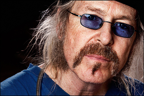 PK Dwyer — Editorial portrait of folk-blues performer, close crop, LA-based energy