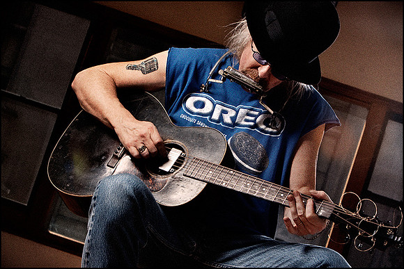 PK Dwyer — Live busker portrait, guitar in hand, Americana style on NYC stree