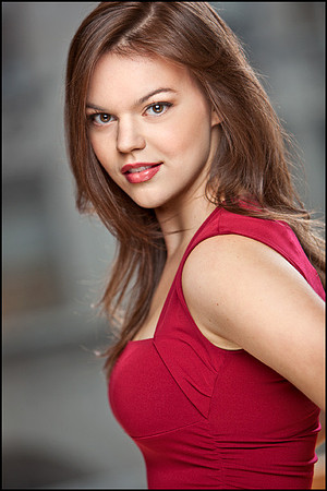 Confident, classic headshot with warmth and strength