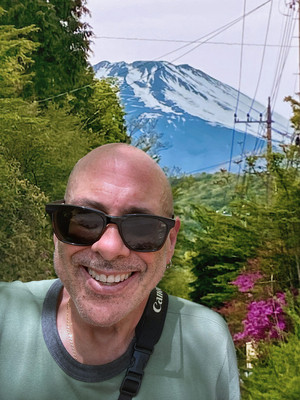 Rod Goodman, NYC headshot photographer, smiling in front of Mt. Fuji – 2025