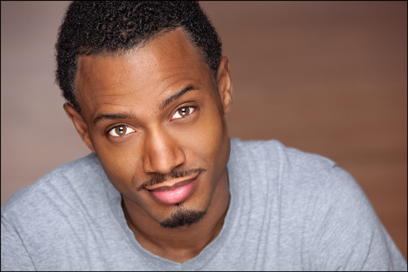 Headshot of Terrence J, actor and TV host, relaxed and confident portrait in NYC